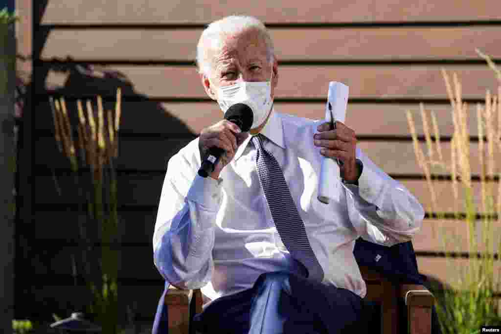 Joe Biden speaks about safely reopening schools amid the COVID-19 pandemic, in Wauwatosa, Wis., Sept. 3, 2020. The campaign stop was part of his trip to Wisconsin to discuss U.S. racial tensions in the wake of a Black man&#39;s shooting by police in Kenosha.