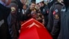 Relatives of Hasan Huseyin Canbaz, who was killed in an attack by PKK members at the Turkish aerospace and defense company TUSAS on Wednesday, mourn during a funeral at Karsiyaka mosque in Ankara, Oct. 24, 2024. 