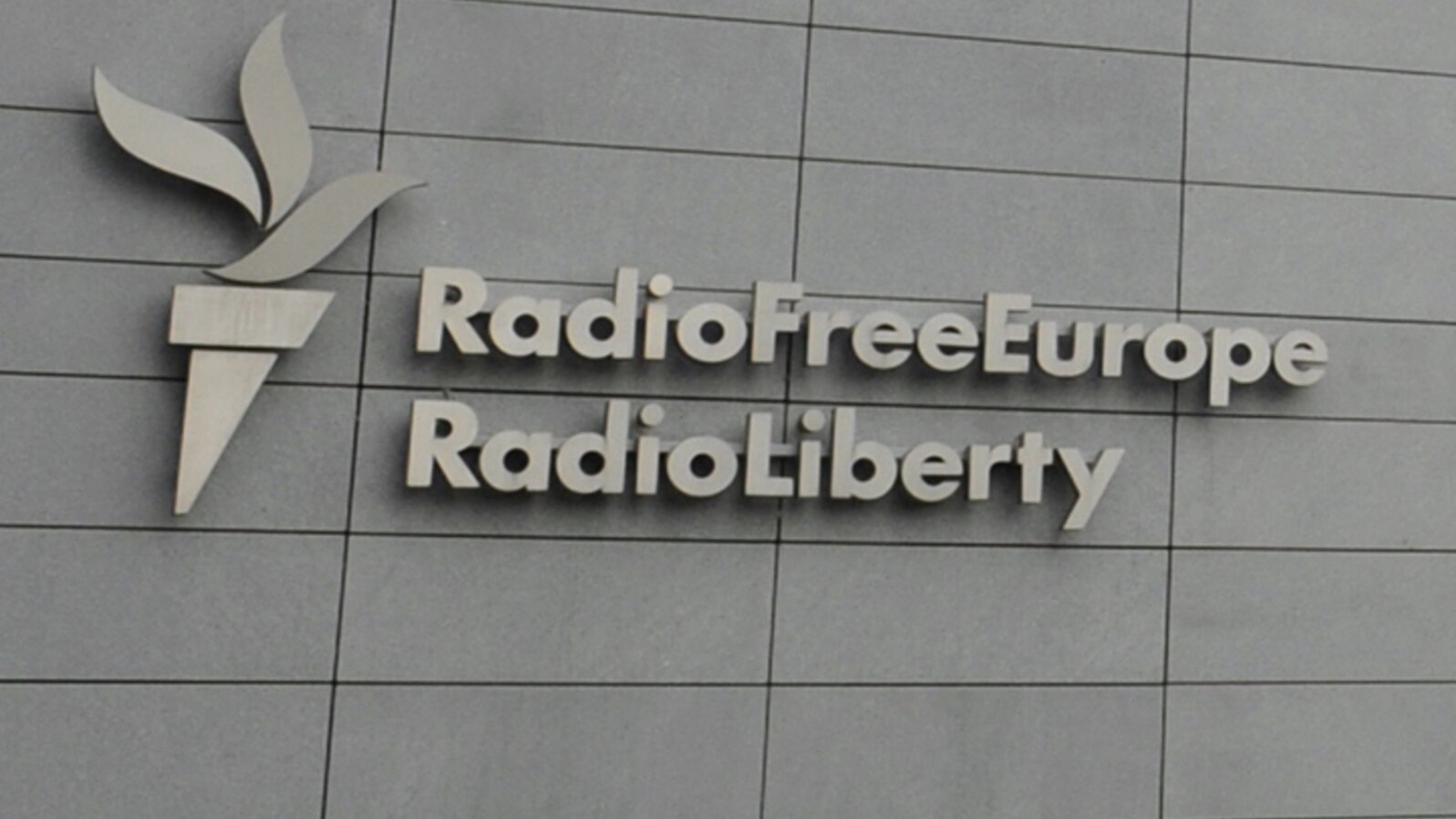 FILE - A sign for Radio Free Europe/Radio Liberty (RFE/RL) is pictured on the broadcaster's headquarters building, in Prague, Czech Republic, May 12, 2009. 