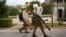 Government fumigators prepare to spray homes for mosquitoes in Havana, Cuba, Feb. 22, 2016.