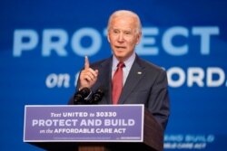 Democratic presidential candidate former Vice President Joe Biden speaks about the coronavirus and health care at The Queen theater, Oct. 28, 2020, in Wilmington, Del.