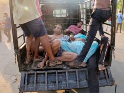 People affected by the gas leak at LG Polymers plant in Visakhapatnam, India, are evacuated, May 7, 2020.