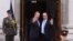 French President Francois Hollande (R) is greeted by Irish Prime Minister Enda Kenny after he arrives at Government Buildings in Dublin, Ireland, July 21, 2016. 