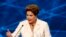 Presidential candidate and Brazilian President Dilma Rousseff of Workers' Party (PT) speaks during the first television debate at the Bandeirantes TV studio in Sao Paulo, Aug. 26, 2014. 