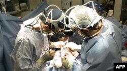 Doctors in the United States operate on the brain of a two year old boy who suffers from epileptic seizures