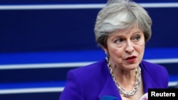 PM Theresa May memberikan keterangan kepada media di Brussels dalam KTT Uni Eropa 18 Oktober lalu. 