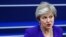 Britain's Prime Minister Theresa May speaks to the media as she arrives at the European Union leaders summit in Brussels, Belgium, Oct. 18, 2018.