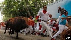 Festival San Fermin, atau festival pelepasan banteng liar di Pamplona, Spanyol utara (12/7).