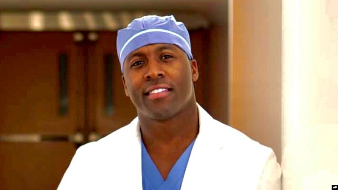This March 30, 2020 photo shows Dr. Elvis Francois at the Mayo Clinic in Rochester, Minn. The orthopedic surgery resident has gone viral thanks to his top-notch musical performances at hospitals. 