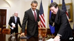 President Barack Obama, European Council President Herman Van Rompuy, left, and European Commission President Jose Manuel Barroso in the Roosevelt Room of the White House Washington, Monday, Nov. 28, 2011.