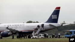 Un vuelo de U.S. Airways y sus pasajeros fueron inspeccionados después de aterrizar en el aeropuerto internacional de Filadelfia.