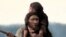 A reconstruction of a Neanderthal father and his daughter is seen in this undated handout image