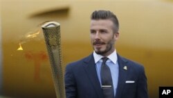 Beckham berharap bisa terpilih memperkuat kesebelasan Inggris dalam Olimpiade London (foto, 18/5/2012). 