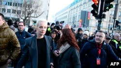 FILE — Yulia Navalnaya (C), widow of the late Kremlin opposition leader Alexei Navalny, leaves after voting for the presidential election at the Embassy of Russia in Berlin, on March 17, 2024.