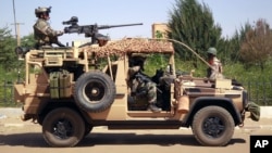 French special forces drive through the city of Gao, Northern Mali, Jan. 30, 2013. 