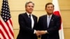 U.S. Secretary of State Antony Blinken, left, shakes hands with Japanese Prime Minister Shigeru Ishiba at Ishiba's office in Tokyo, Jan. 7, 2025.