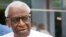 Lamine Diack (L), former head of International Association of Athletics Federations (now World Athletics), from 1999 to 2015, leaves the courthouse in Paris on June 10, 2020, during the midday break of his trial on charges of accepting millions of dollars