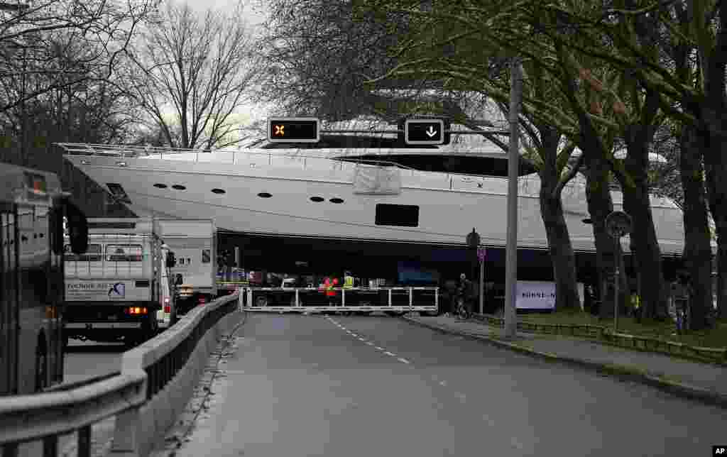 The yacht Princess 98 is carried by a truck to the fairground in Duesseldorf, Germany. The Princess 98 with a length of 30 meters (90 ft) weighs 100 tons and will be on display at the international boat fair in Duesseldorf from Jan. 18 until Jan. 26. The price will be around 7 million euro ($9.5 million).
