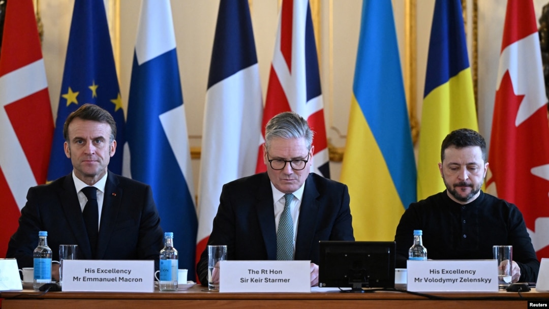 France's President Emmanuel Macron, Britain's Prime Minister Keir Starmer and Ukraine's President Volodymyr Zelenskyy prepare to hold a plenary meeting at a summit held at Lancaster House in central London on March 2, 2025. 