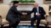 U.S. President Joe Biden shakes hands with Indonesia's President Prabowo Subianto, left, during a meeting in the Oval Office of the White House in Washington, Nov. 12, 2024.