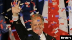 Democratic Alabama U.S. Senate candidate Doug Jones acknowledges supporters at the election night party in Birmingham, Alabama, Dec. 12, 2017. 