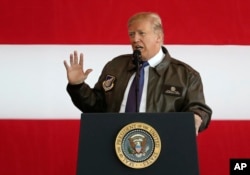 U.S. President Donald Trump addresses the U.S. troops at the U.S. Yokota Air Base, on the outskirts of Tokyo, Nov. 5, 2017.