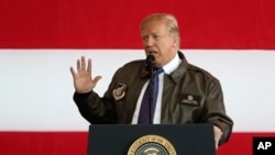 U.S. President Donald Trump addresses the U.S. troops at the U.S. Yokota Air Base, on the outskirts of Tokyo, Nov. 5, 2017. 