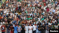 Students march as they rally to mark one month of the end of former Prime Minister Sheikh Hasina's regime, at the University of Dhaka, in Dhaka, Bangladesh, Sept. 5, 2024.