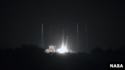 Phi thuyền Dragon, nằm trên hỏa tiễn Falcon 9, được phóng đi từ Mũi Canaveral, Florida, ngày 21/9/2014.