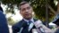 FILE - California Attorney General Xavier Becerra talks to reporters after a news conference at University of California, Los Angeles, Aug. 2, 2018.