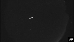 This photo provided by NASA shows the Orionid meteors on Oct. 13, 2015. (Jet Propulsion Laboratory/NASA via AP)