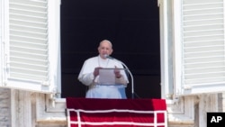 Pope Francis speaks during the Angelus prayer from his studio window overlooking St. Peter's Square, after celebrating a Mass for the Feast of Rome's Patrons Saints Peter and Paul, at the Vatican, June 29, 2020. 
