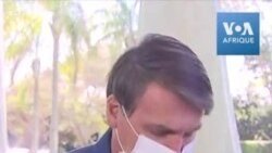 Brésil: positif au coronavirus, le président Bolsonaro enlève son masque