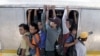 Indonesia's Train Surfers Highlight Traffic Woes