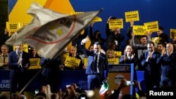 Italy's Deputy Prime Minister Luigi di Maio waves at the final European election rally of the 5-Star Movement, in Rome, May 24, 2019.