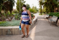 Arizona State University political science major Betzabel Ayala poses for a photo on campus Tuesday, Sept. 8, 2020, in Tempe, Ariz. Because of the coronavirus, Ayala is one of hundreds of thousands of off-campus U.S. college students who are being counted