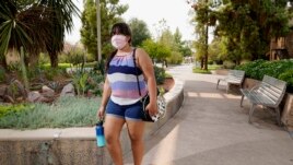 Arizona State University political science major Betzabel Ayala poses for a photo on campus Tuesday, Sept. 8, 2020, in Tempe, Ariz. Because of the coronavirus, Ayala is one of hundreds of thousands of off-campus U.S. college students who are being counted