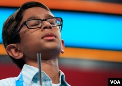 Rohan Rajeev, 14, from Edmond, Okla., reacts after misspelling the word marram and eventually losing to Ananya Vinay from Fresno, Calif., during the finals of the 90th Scripps National Spelling Bee, in Oxon Hill, Md., Thursday, June 1, 2017. (AP Photo/Manuel Balce Ceneta)