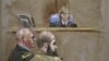 In this court room sketch, Judge Col. Tara Osborn, top, Maj. Nidal Malik Hasan, right, and defense attorney, Lt. Col. Kris Poppe, left, are shown, Wednesday, Aug. 21, 2013, in Fort Hood, Texas. Hasan rested his case Wednesday without calling any witnesses