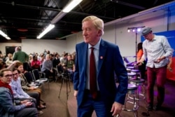 Republican presidential candidate former Massachusetts Gov. Bill Weld steps off stage after speaking at a the Faith, Politics and the Common Good Forum at Franklin Jr. High School, Jan. 9, 2020, in Des Moines, Iowa.