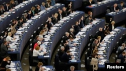 Members of the European Parliament take part in a voting session in Strasbourg, France, April 14, 2016. 