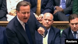 PM Inggris David Cameron dalam sidang parlemen ketika mengemukakan dukungannya untuk melakukan serangan militer ke Suriah, namun hal ini ditolak parlemen Inggris (29/8).