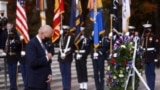 U.S. President Joe Biden attends a wreath laying ceremony to mark Veterans Day 