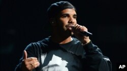 FILE - This Sept. 21, 2013 file photo shows Drake performing at the iHeartRadio Music Festival in Las Vegas. 