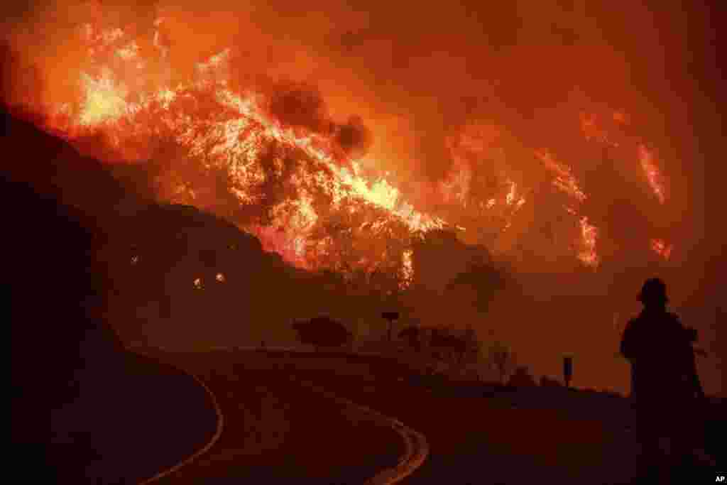 The Thomas fire burns through Los Padres National Forest near Ojai, California, Dec. 8, 2017. 
