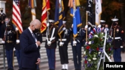 U.S. President Joe Biden attends a wreath laying ceremony to mark Veterans Day 