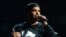 FILE - This Sept. 21, 2013 file photo shows Drake performing at the iHeartRadio Music Festival in Las Vegas. 