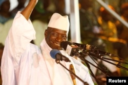FILE - Gambia's President Yahya Jammeh smiles during a rally in Banjul, Gambia, Nov. 29, 2016.