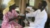 A woman is given a free HIV/AIDS test in Lira, northern Uganda, September 9, 2007. 