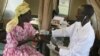 A woman is given a free HIV/AIDS test in Lira, northern Uganda, September 9, 2007. 